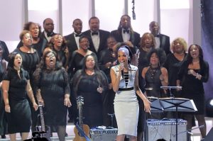 Michelle Williams backed by the Trinity Mass Choir at the Chicago Voices Concert. Photo by Cory Weaver