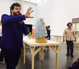 Curator Omar Kholeif, l, and Iraqi-American artist Michael Rakowitz give an opening day tour of "Backstorke of the West" at the MCA.
