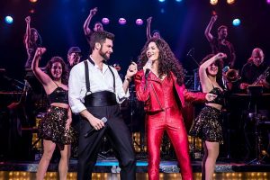 Mauricio Martinez as Emilio Estefan and Christie Prades as Gloria Estefan plus the company of On Your Feet! Matthew Murphy photo