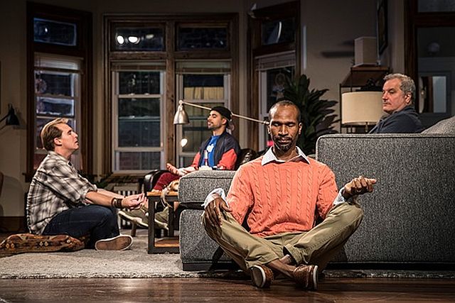 A yoga style exercise helps the guys in Support Group For Men at Goodman Theatre. )Photo by Liz Lauren)