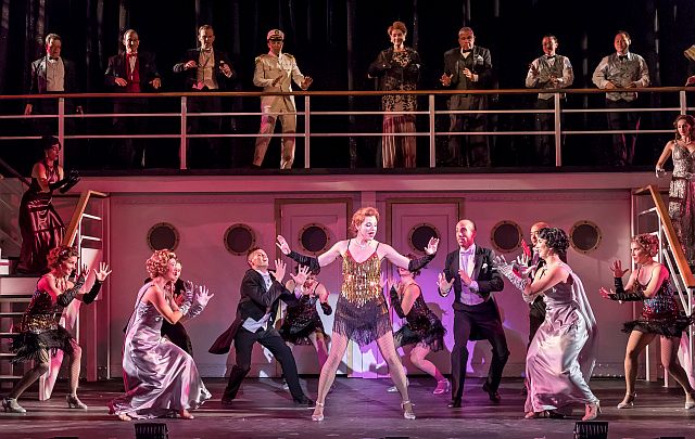 Erica Evans, c, and ensemble in 'Anything Goes' at Music Theater Works in Cahn Auditorium. (Photo by Brett Beiner)