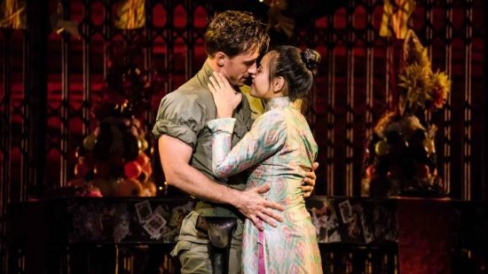 Anthony Festa (Chris) and Emily Bautista (Kim) in Miss Saigon at the Cadillac Palace Theatre. (Matthew Murphy photo)