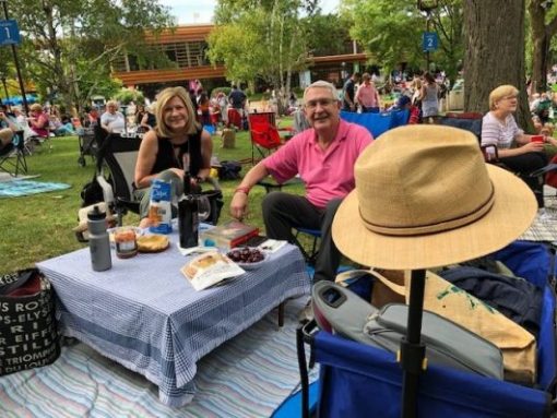 Frequent Revinia goers, Donna and Dan Berman, Deerfield, know to get to popular concerts early. and Dan knows to bring a hat because the sun changes. (J Jacobs photo)