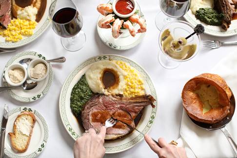 Larey sets the table for Chicago Restaurant Week. (Photo courtesy of Lawry's)