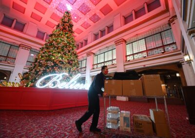 Walnut Room Manager Gino Tarallo loads up with food packages for front-line works. (Photo by Daniel Boczarski/Getty images)