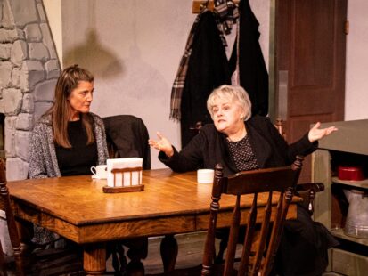 Left: Laura Leonardo Ownby (Rosemary), Susan Hofflander (Aoife). in Outside Mullingar at Citadel Theatre. (photo by North Shore Camera Club)