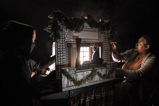 Lizi Breit and LaKecia Harris in "Manual Cinema's Christmas Carol" at Writers Theatre (Liz Lauren photographer)